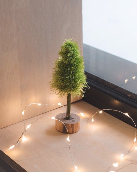 Picture of Small fluffy Christmas Tree with wooden base