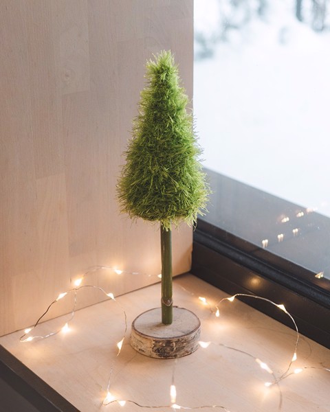 Picture of Tall fluffy Christmas Tree with wooden base