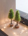 Picture of Small Fluffy Christmas Tree with wooden base