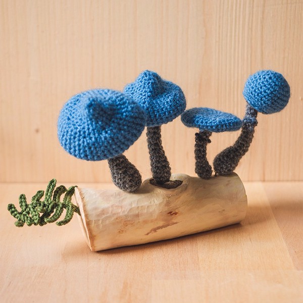 Picture of Crochet Blue Mushrooms on Wooden Base