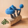 Picture of Crochet Blue Mushrooms on Wooden Base